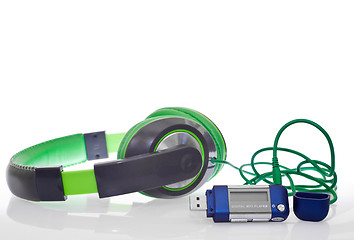 Image showing music player and green headphones