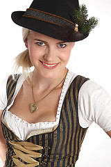 Image showing Young blonde woman in traditional costume