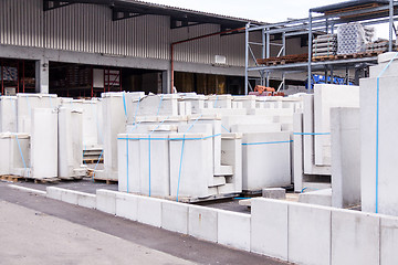 Image showing Cement building blocks stacked on pallets