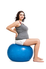 Image showing Pregnant woman doing pilates exercises