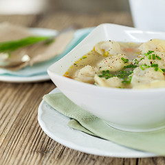 Image showing Dish of savory pork tortellini in broth pelmeni russian