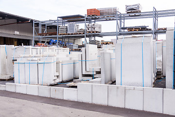 Image showing Cement building blocks stacked on pallets