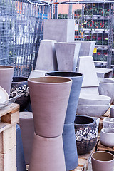 Image showing Glazed and unglazed ceramic flower pots