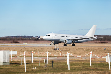 Image showing Passenger airliner taking off at an airport