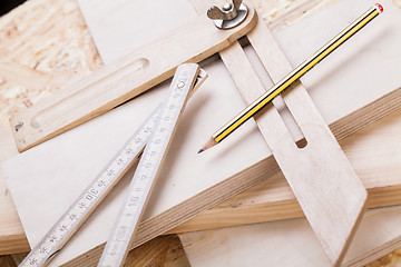 Image showing Carpenters level, ruler and right angle