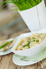 Image showing Dish of savory pork tortellini in broth pelmeni russian