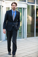 Image showing Businessman standing waiting for someone