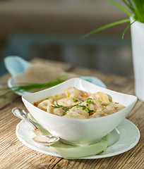 Image showing Dish of savory pork tortellini in broth pelmeni russian