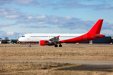 Image showing Passenger airliner taking off at an airport