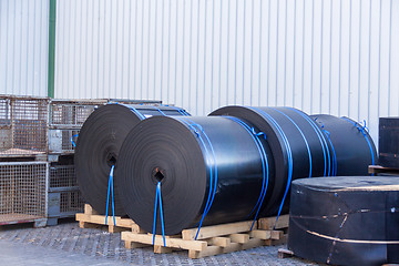 Image showing Rolls of black industrial plastic