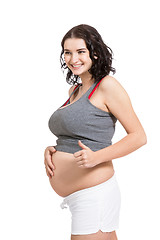 Image showing Pregnant woman giving a thumbs up gesture