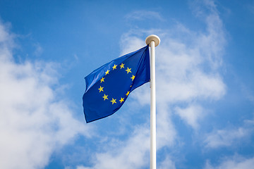 Image showing The fluttering flag of European Union on a pole