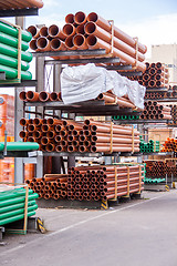 Image showing Plastic pipes in a factory or warehouse yard