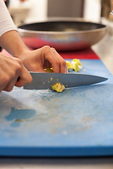 Image showing Chef chopping salad ingredients