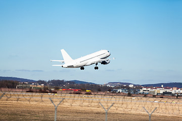 Image showing Passenger airliner taking off at an airport