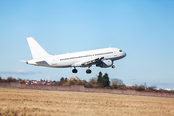 Image showing Passenger airliner taking off at an airport