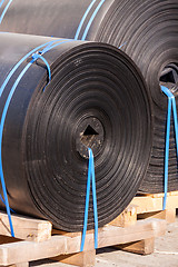 Image showing Rolls of black industrial plastic