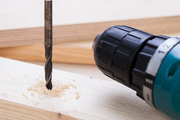 Image showing Battery operated hand drill and bit