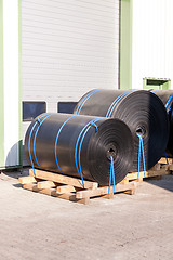 Image showing Rolls of black industrial plastic