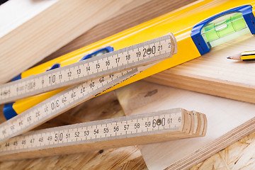 Image showing Carpenters level, ruler and right angle