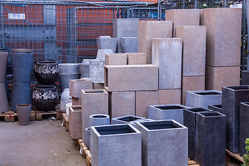 Image showing Glazed and unglazed ceramic flower pots