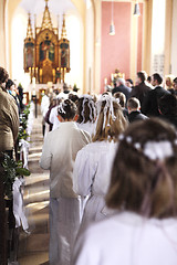 Image showing Communion children move into church