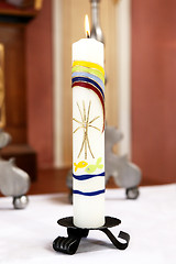 Image showing Burning candle in church