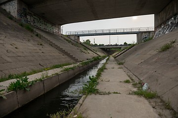 Image showing Sewage canal outdoors with water