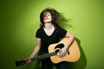 Image showing Rock woman with guitar