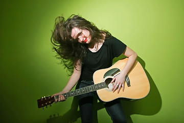 Image showing Woman and guitar