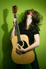 Image showing Rock woman enjoying guitar