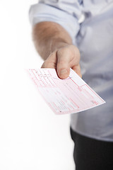 Image showing Man holds doctor prescription in hand