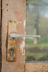 Image showing door fragment with old door handle with key hole 