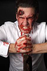 Image showing Psychopath with bloody knive