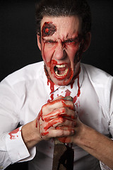 Image showing Psychopath with bloody knive