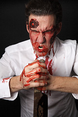 Image showing Psychopath with bloody knive