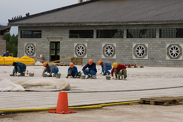 Image showing Chinese workers building Dragons Gate