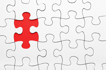 Image showing Red puzzle piece missing