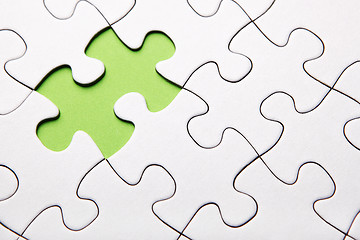 Image showing Green puzzle piece missing