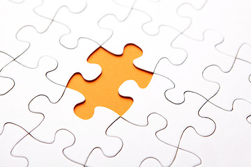 Image showing Orange puzzle piece missing