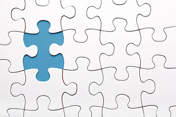 Image showing Blue puzzle piece missing