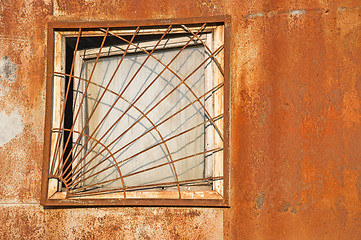 Image showing Old window on the rusty wall.