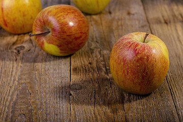 Image showing Apples on a wooden table