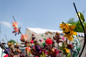 Image showing unreal paper yellow sunflower on fair background 