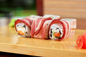 Image showing Sushi roll with bacon