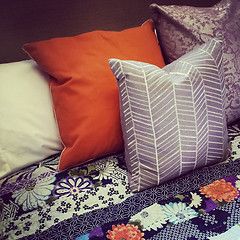 Image showing Colorful pillows on a bed