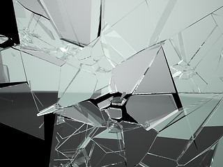 Image showing Many large pieces of shattered glass isolated on black 