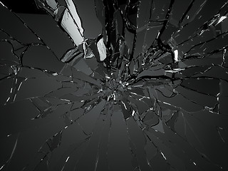 Image showing Many pieces of shattered glass over black