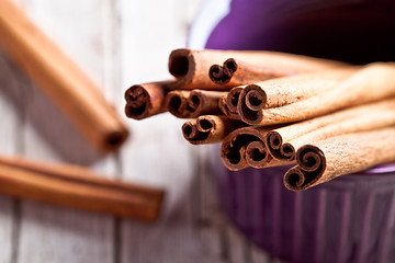 Image showing cinnamon sticks in bowl