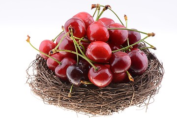 Image showing Sweet cherries in a nest